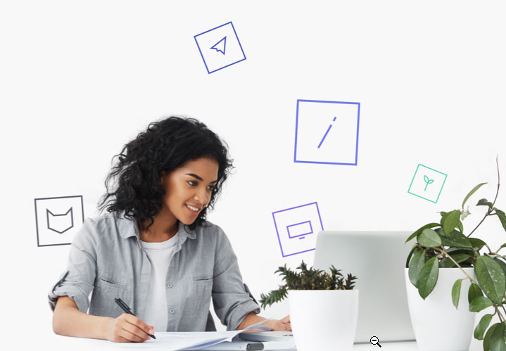 Tutor working with notes and laptop